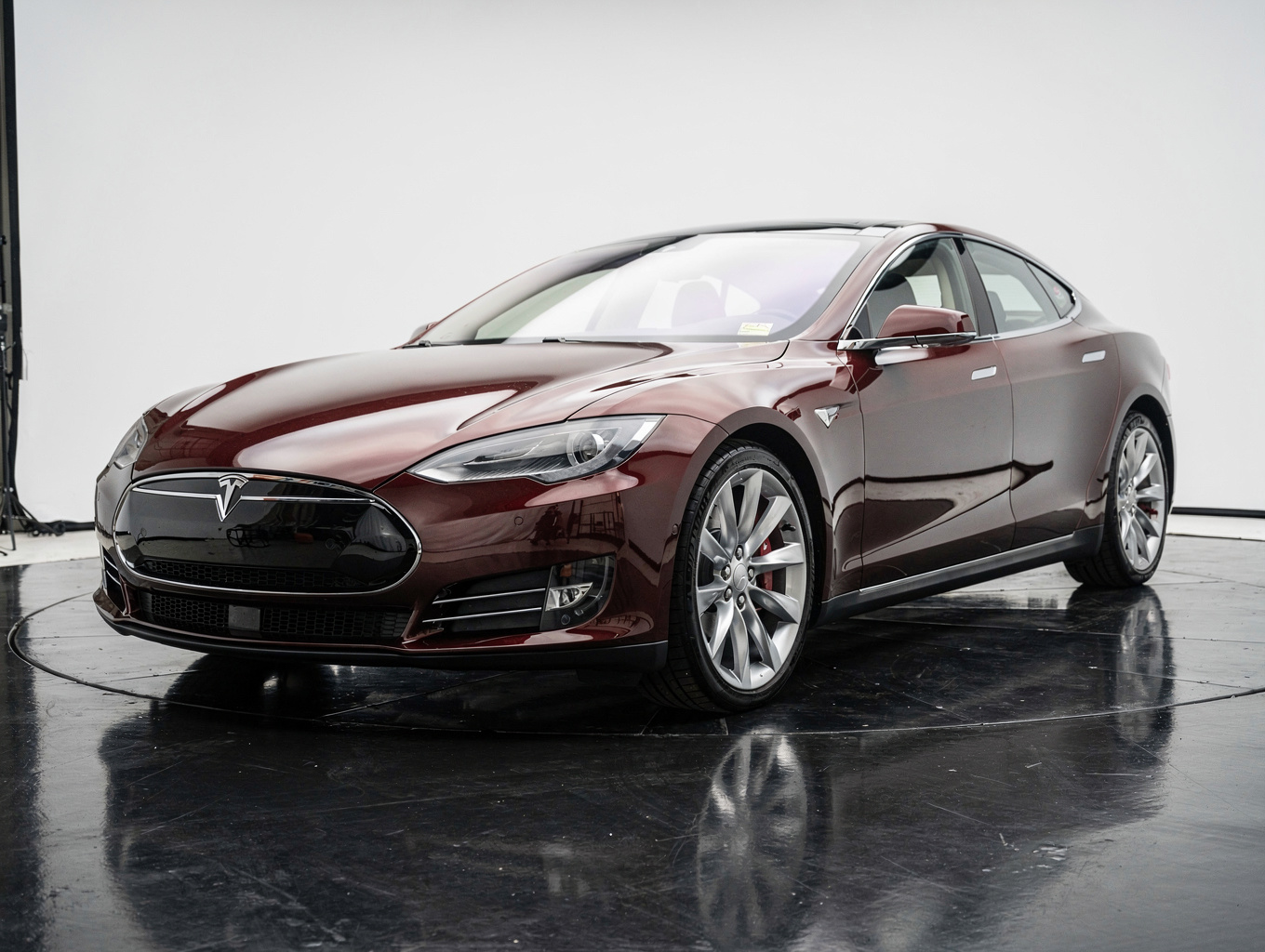 Tesla Model S luxury performance sedan in studio lighting